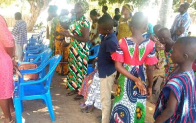 Twenty-four People Worship Under a Tree